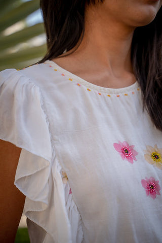 White and pink frill top