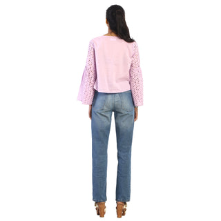 Delicate pink top with bell sleeves back view